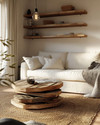 A cozy rustic living room in an apartment setting, featuring a compact linen sofa, a reclaimed wood nesting coffee table, and open shelving made from rough-hewn timber. Natural light filters through the window, illuminating jute rugs and woven wool throws, complemented by a simple pendant light with an Edison bulb. — close-up of textures and materials