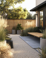 A Scandinavian front yard featuring a pea gravel path, large concrete planters with ornamental grasses, a low woven willow fence, and a slatted wooden bench by the matte black front door. — close-up of textures and materials