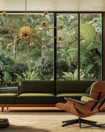 A Mid-Century Modern living room showcasing a low-slung olive green sofa with a walnut frame, an Eames Lounge Chair, and a brass Sputnik chandelier, all overlooking a lush garden through large windows. — close-up of textures and materials
