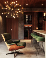 Mid-Century Modern wine cellar featuring a walnut Eames Lounge Chair, a Sputnik chandelier, sleek teak wine racks, and a concrete tasting bar with green upholstered stools. — styling and décor detail