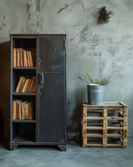 Industrial baby and kids room with a dark gray metal locker, a reclaimed wood pallet bookshelf, and a galvanized metal storage bucket on a concrete-effect accent wall. — styling and décor detail