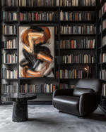 A modern library featuring floor-to-ceiling matte black bookshelves filled with books, a low-profile charcoal leather armchair, a black marble side table, and a large abstract art piece on a wall painted in Benjamin Moore's Gray Owl, with warm task lighting. — close-up of textures and materials