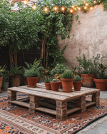 A budget-friendly Boho Backyard featuring a low wooden pallet coffee table, layered vintage rugs in muted terracotta and beige, and an assortment of potted green plants in upcycled terra cotta and ceramic containers, all illuminated by warm solar string lights strung overhead. — close-up of textures and materials