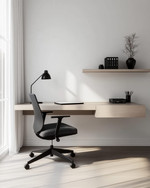 Modern home office with a minimalist aesthetic featuring a light oak floating desk, a black ergonomic chair, white walls, and a sleek matte black desk lamp. — styling and décor detail