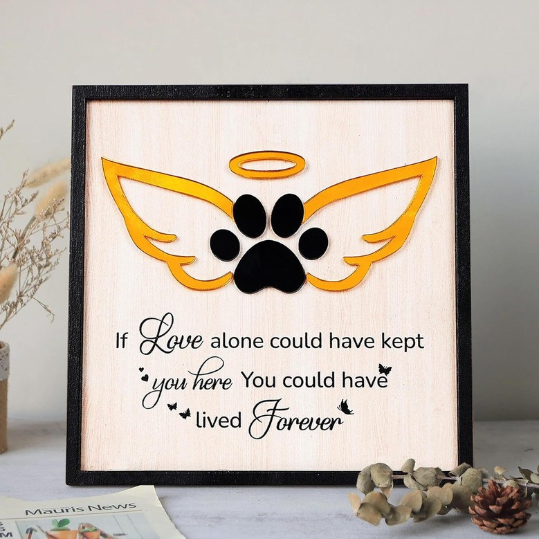 Wood memorial sign engraved with olive branch