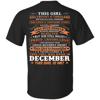 This Girl Has Fought A Thousand Battles And Cried Thousand Tears Was Born In December Print On Back Graphic Design Printed Casual Daily Basic Unisex T-Shirt - Thegiftio UK