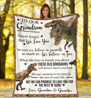 To Our Grandson Never Forget That We Love You We Hope You Believe In Your Self Dinosaur Fleece Blanket - Seseable