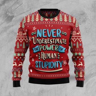 Never Underestimate The Power Of Human Stupidity Ugly Christmas Sweater | Favorety UK