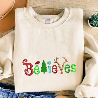 Christmas Believes Embroidered Sweatshirt, Christmas Embroidery Crewneck For Family | Mazezy