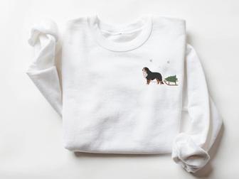 Embroidered Sweatshirt, Bernese Mountain Dog Harvesting A Christmas Tree For Family | Mazezy