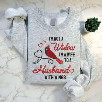 Not A Widow A Wife To A Husband With Wings Embroidered Sweatshirt For Family | Mazezy