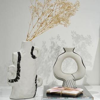 Nordic White Vase Ceramic Porcelain Irregular Twist The Flower Tube And Cup Shaped Vases | Rusticozy CA