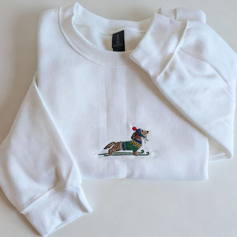 Embroidered Skiing Dachshund Holiday Christmas Embroidered Sweatshirt - Monsterry