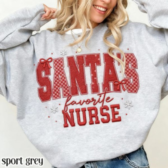 Nurse Christmas Embroidered Sweatshirt Santas Favorite Nurse Pediatric Xmas Sweater Funny Holiday RN Pullover Festive Snowflake Nursing Crewneck Gift - Monsterry
