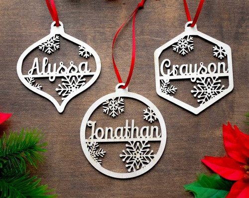 Christmas ornament laser-cut wood bauble with custom name, round gift tag for holiday decor with ribbon hanger, made in USA | Family Wall Decor