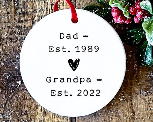 Grandpa to be Christmas ornament for tree, heartfelt new grandparent reveal gift in round white ceramic with holly design | Family Wall Decor