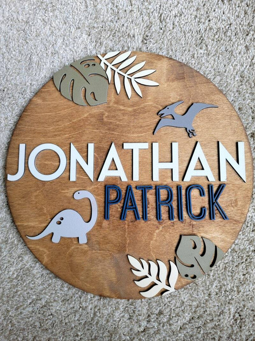 Dinosaur round wood sign, personalized with baby name; natural wood grain, teal and green palette for baby boy nursery | Family Wall Decor
