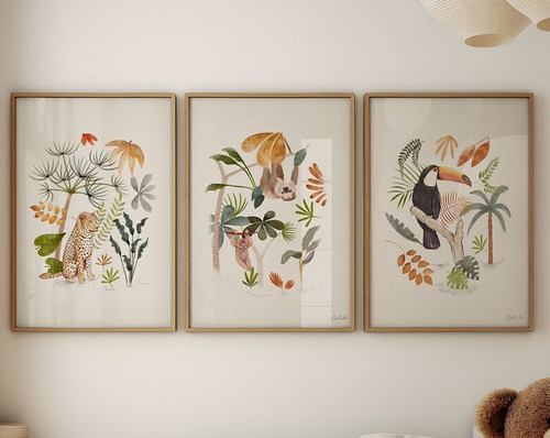 Amazon rainforest jungle nursery canvas wall art with toucan, sloth, and leopard amid tropical leaves for kids' room decor | Family Wall Decor