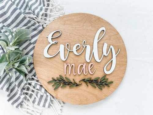 Greenery round wooden nursery sign personalized with baby girl name; natural wood, name lettering, wall decor for nursery. | Family Wall Decor