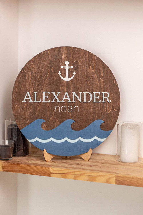Nautical nursery sign round wooden decor, personalized with child's name, anchor and sailboat icons for kids room wall | Family Wall Decor