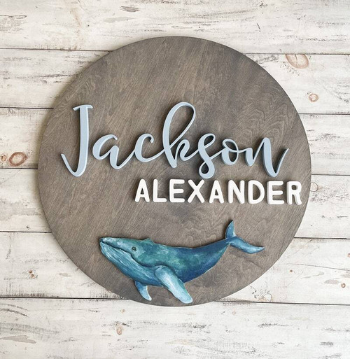 Nautical whale wood sign personalized with baby name for nursery wall decor, ocean theme accent, thoughtful baby shower gift | Family Wall Decor