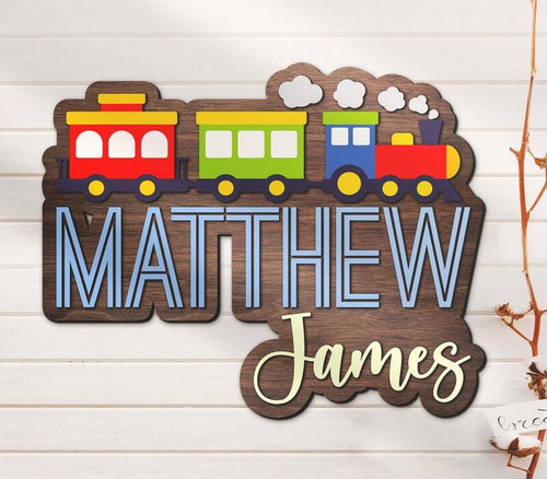 Train-themed wooden nursery name sign personalized with baby name, farmhouse wall decor for baby's room, baby shower gift | Family Wall Decor