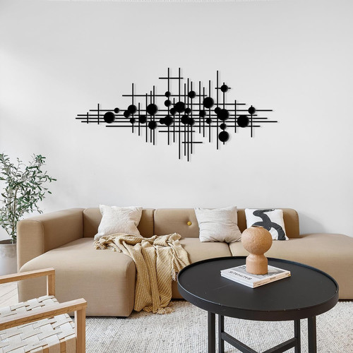 Abstract geometric black metal wall art for living room, with layered 3D cutouts and sharp angular lines in a matte finish. | Family Wall Decor