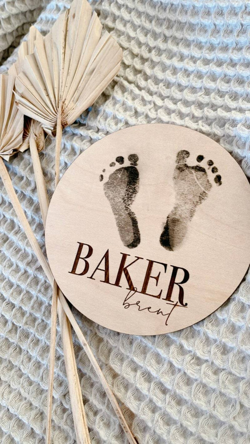 Baby footprints custom wood wall art, engraved with name and birth date, natural finish, nursery decor for new parents. | Family Wall Decor
