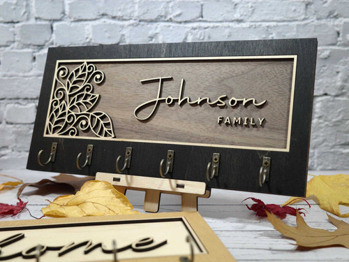 Personalized key holder wall decor with family name and date on rustic wood, 4 hooks for entryway; thoughtful housewarming gift | Familywalldecor