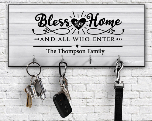 Bless This Home wood key holder personalized with family name, wall hooks for entryway, thoughtful housewarming gift | Familywalldecor