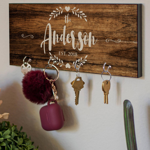 personalized wooden key rack with engraved family last name, rustic farmhouse style, thoughtful housewarming gift for couples | Familywalldecor