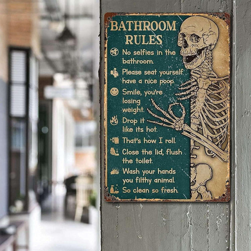 Retro skeleton metal wall sign, distressed vintage bathroom decor with grinning skull art and aged steel finish, portrait | Familywalldecor
