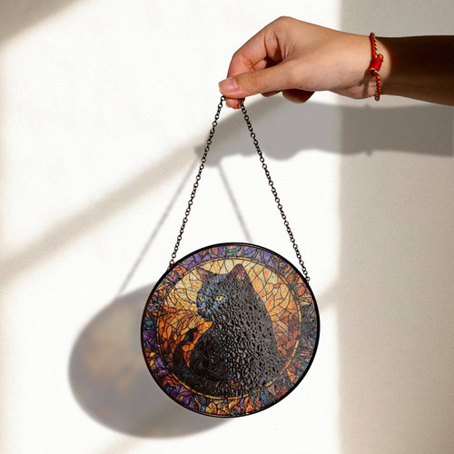 Black cat stained glass suncatcher for Halloween decor, handcrafted window ornament casts a spooky glow for seasonal accents | Familywalldecor