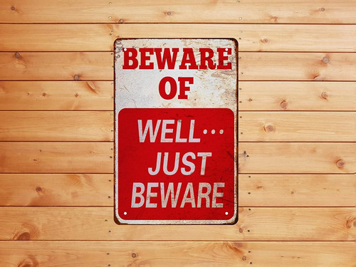 Halloween metal sign with 'Beware' text, vintage-style wall decor for a garage or man cave; novelty home art, gift for him | Familywalldecor