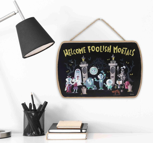 Haunted Mansion wood wall sign featuring Welcome Foolish Mortals text, perfect for Halloween decor in your home entryway. | Familywalldecor
