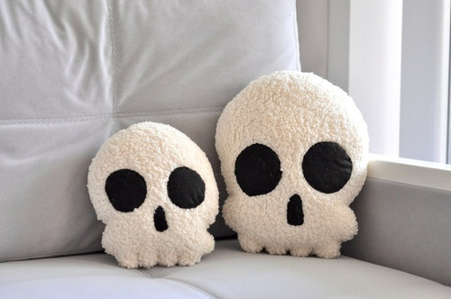 Skull plush Sherpa pillow, soft gothic Halloween cushion with grinning skeleton motif for spooky living room or sofa decor | Familywalldecor