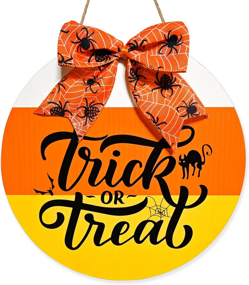 Halloween wooden door sign with Trick or Treat lettering, spider web, and candy corn for front porch outdoor decor | Familywalldecor