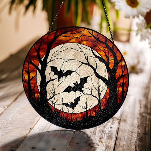 Halloween bat stained glass suncatcher for gothic fall window decor, textured black bat with chain catching warm autumn light | Familywalldecor