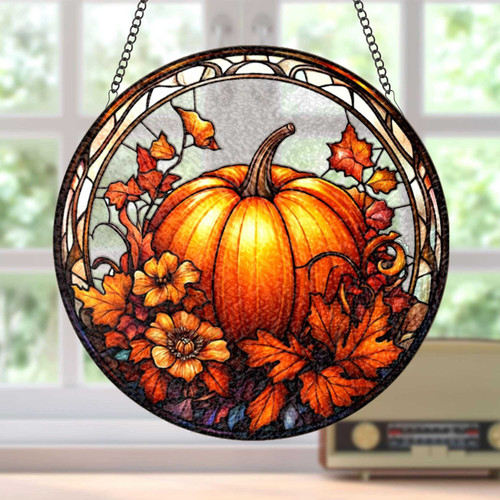 Fall pumpkin stained glass suncatcher hanging in a sunny window, orange glass with green stem, autumn Halloween home decor | Familywalldecor