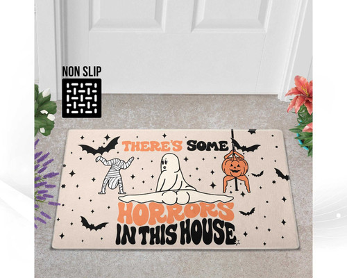 Halloween doormat with 'There's Some Horrors In This House' pun, funny spooky welcome for entryway decor, great seasonal gift | Familywalldecor