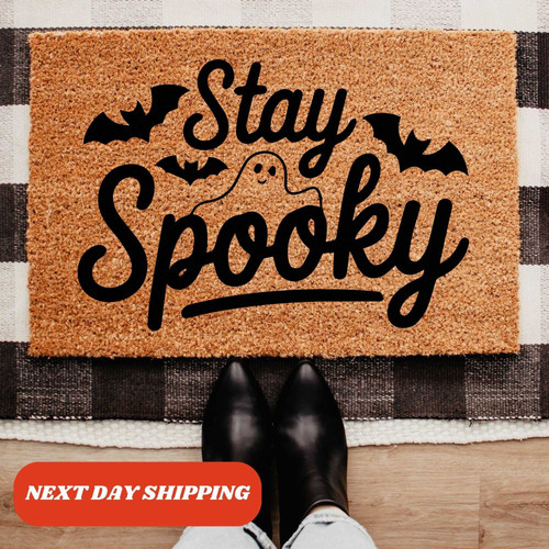 Halloween doormat with 'Stay Spooky' text and ghost graphic, outdoor mat for front door entryway seasonal decor | Familywalldecor