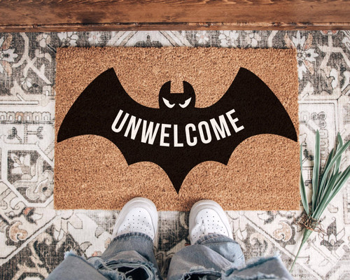 Unwelcome bat Halloween doormat with spooky graphic and lettering, ideal fall entryway decor for porches and front doors | Familywalldecor