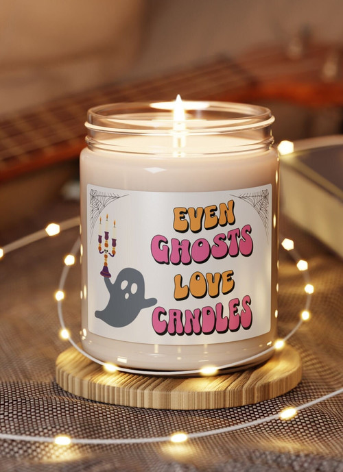 Ghost Halloween candle, white soy wax ghost shape with simple face, single wick, front view on mantel for cozy fall decor. | Familywalldecor