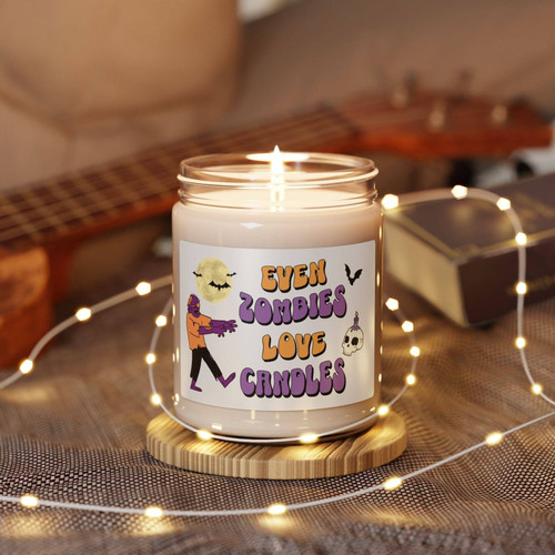 Funny zombie soy candle with cute Halloween design, cozy fall decor for mantel or shelf, adds playful spooky charm | Familywalldecor