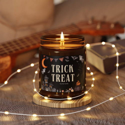 Halloween soy candle with Trick or Treat label in amber glass jar, cotton wick; spooky season decor for mantel or entryway | Familywalldecor