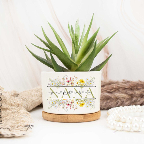 Mom birthflower ceramic plant pot, smooth glazed cylinder with custom birthflowers, front-facing, perfect Mother's Day gift | Familywalldecor