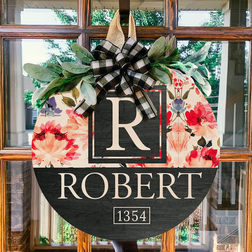 Floral circle wood sign wall decor, personalized with custom family name, engraved for Thanksgiving or housewarming gift. | Familywalldecor