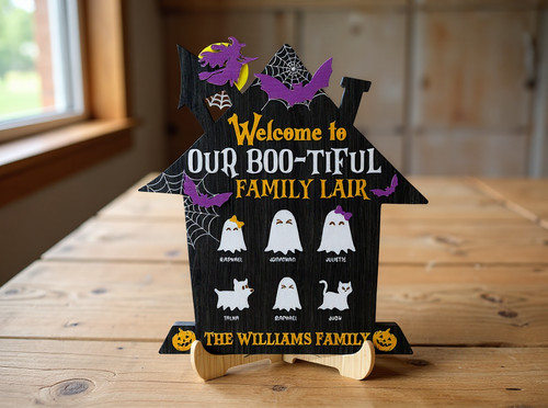Halloween wood sign featuring 'Our Bootiful Family' text with cute ghost accents, perfect for haunted entryway décor. | Family Wall Decor