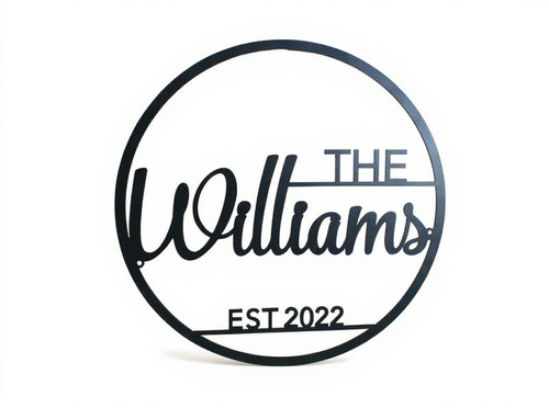 Personalized family name metal sign, black powder-coated steel, round cursive design with custom names and date, wedding gift | Family Wall Decor