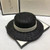 One Pc Summer New Pearl Decor 4 Colors Solid Flat Top Sun Protection Adjustable Weave Seaside Beach Straw Hat 54-58Cm Black